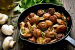 Fried mushrooms in frying pan