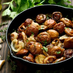 Fried mushrooms in frying pan