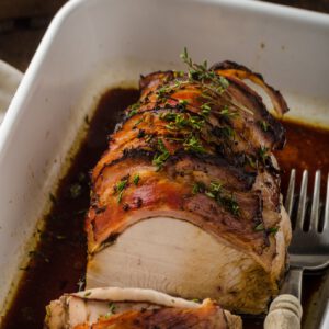 Roast turkey with herbs and bacon